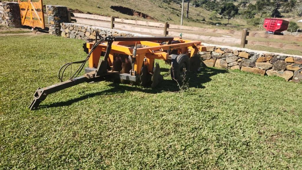 GRADE ARADORA BUDNY  12 DISCOS HIDRÁULICA